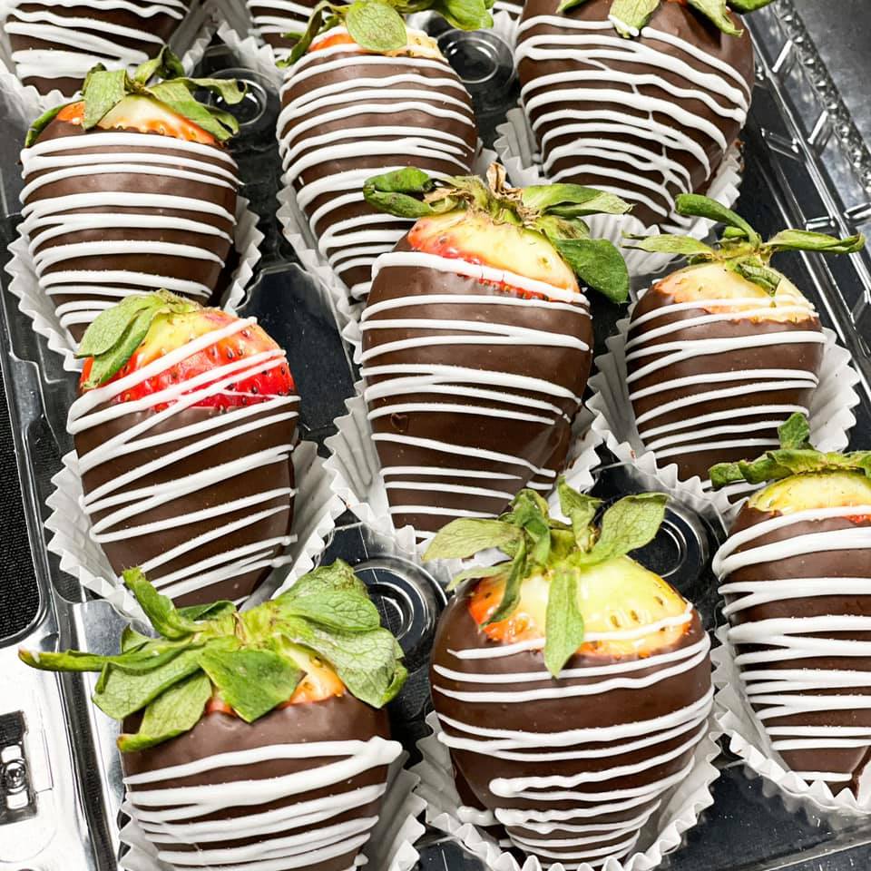 chocolate covered strawberries with white stripes